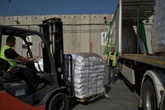 90 truckloads of aid now in Gaza after delays at crossing with Israel