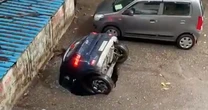 Sinkhole swallows car in shocking video from Mumbai amid heavy rains