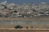 Where will Israeli troops withdraw to after ceasefire agreement?
