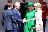 King and Queen welcome Macron and wife Brigitte with Windsor parade