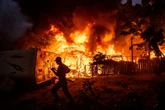 Homes destroyed as quick wildfire burns historic gold mining town