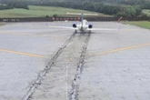 Plane stopped by safety zone at end of Virginia airport runway