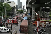 Eight dead as cargo train hits public bus in Thailand’s capital