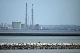 Fukushima nuclear plant workers evacuate after Japan warns of tsunami