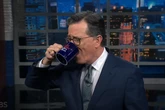 Colbert does literal spit-take while trolling CBS corporate bosses
