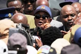 South African president suspends minister accused of ties to criminals