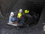 Rescuers race to save 12 workers after gas explosion in coal mine