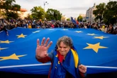 Thousands join a pro-EU rally in Romania’s capital as pivotal presidential runoff looms