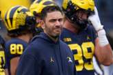 Former Michigan football coach charged with hacking student accounts