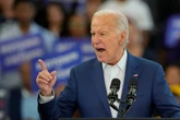 Biden takes aim at Trump’s ‘Project 2025’ and shrugs off calls to quit