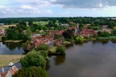 Wealthy villagers outraged as estate car park gets approval