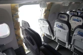 Passengers settle lawsuit over flight where door plug blew out