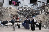 Israeli strikes kill at least 60 in Gaza, medics say