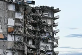 Miami building collapse: Rescuers using machinery and dogs in search
