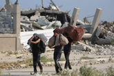 Israel says ‘last opportunity’ for Gazans to leave main city: Live