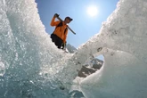 Switzerland's ebbing glaciers show a new, strange phenomenon: Holes reminiscent of Swiss cheese