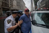 Flag-waving ‘MAGA cruise’ Trump fan arrested outside Trump Tower