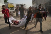 Israeli strikes kill journalists and aid-seekers as Australia backs Palestinian statehood
