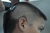 Thai school apologises after girl’s ‘punishment haircut’ sparks outcry