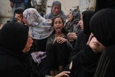 More than 90 Palestinians killed in Gaza overnight, officials say