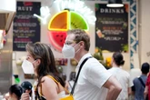 Covid surge hits California as officials urge return to mask wearing