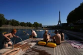 The Seine in Paris is open for swimming. Tourists and residents embrace it as temperatures soar