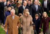 Fans queue overnight at Sandringham to catch glimpse of King and Queen