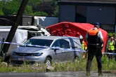 Four dead and five injured after train collides with school bus