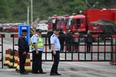 China mine blast death toll revised to 82