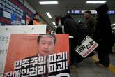 South Korean prosecutors name president as suspect in treason probe