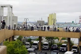 Japan woman evacuating amid tsunami warning dies