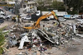 Israel demolishes dozens of Palestinian shops ahead of road project