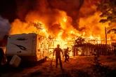 Lightning-sparked wildfires devastate historic California town