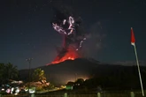 Mount Lewotobi erupts again as ash plumes reach miles away