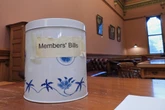 The decorative cookie tin that helps New Zealand make new laws