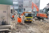 Indonesia school collapse: 61 dead as rescuers find more bodies