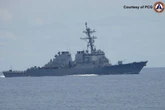 Chinese navy ‘expels’ US warship from disputed South China Sea waters