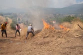 Spain set for hottest June on record as 50,000 flee Turkey wildfires