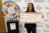 Woman recovers trashed lottery ticket and ends up winning top prize