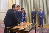 A hard-right lawmaker is sworn in as Greece's migration minister