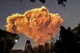 Hot ash sent six miles high as Lewotobi Laki Laki volcano erupts again