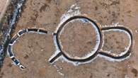 France dig reveals mysterious horseshoe-shaped monument with weapons