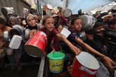 At least 25 killed in new Israeli strikes as famine declared