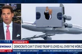 Newsmax host admits he’d ‘definitely criticize’ Biden for Qatar plane