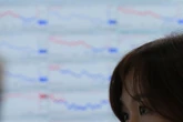 Asian shares are mixed as markets take a breather after recent volatility