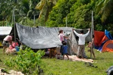 Survivors screamed for help as earthquake flattened homes