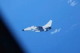 Japan says Chinese fighter jets came within 30m of its spy aircraft