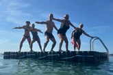 Swimmers protest against removal of rafts from Weymouth beach