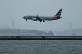 Shirtless traveler tackles, pins crew member as flight is turned back