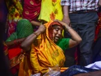 Six arrested after crush at religious event in India kills 121